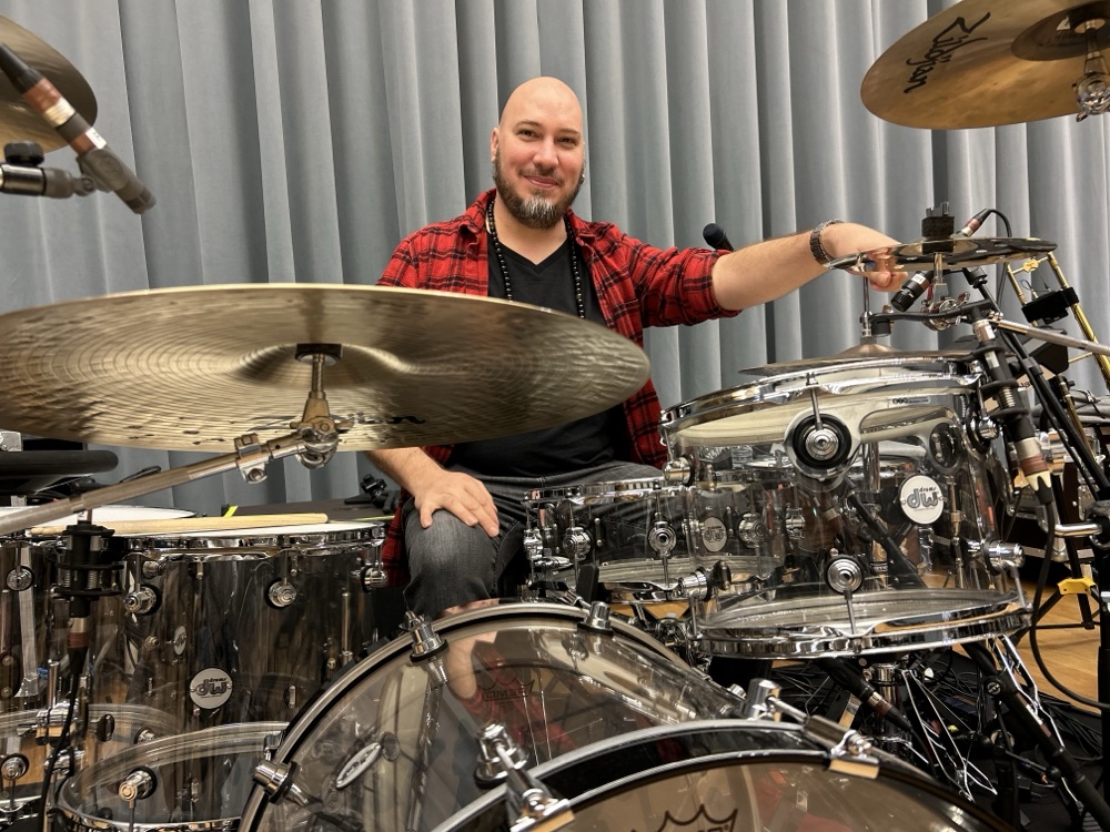 Gregory Louis behind the DW drum kit